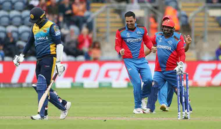 Afghanistan's Mohammad Nabi celebrates taking the wicket of Sri Lanka's Angelo Mathews during the Cricket World Cup match against Afghanistan at the Cardiff Stadium in Wales | AP