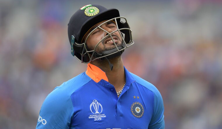 India's Rishabh Pant walks off for 32 during the World Cup first semifinal against New Zealand | AFP