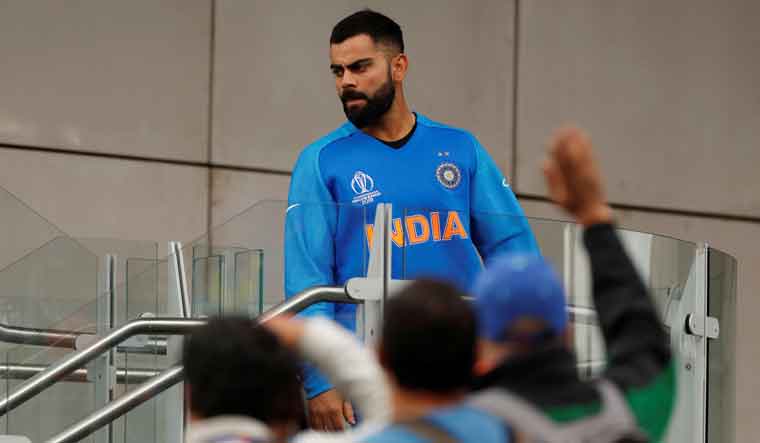 India captain Virat Kohli after his team lost to New Zealand in the world cup semifinal on Wednesday | Reuters