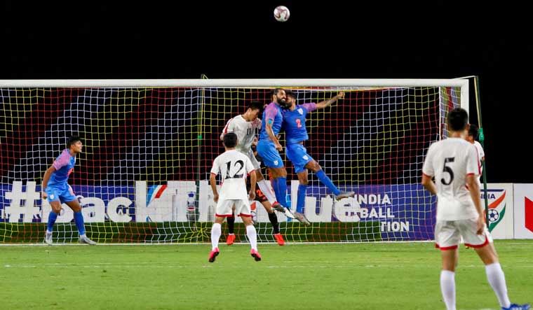 Players of India (in blue) and DPR Korea (in white) in action during the Intercontinental Cup 2019 match in Ahmedabad | PTI