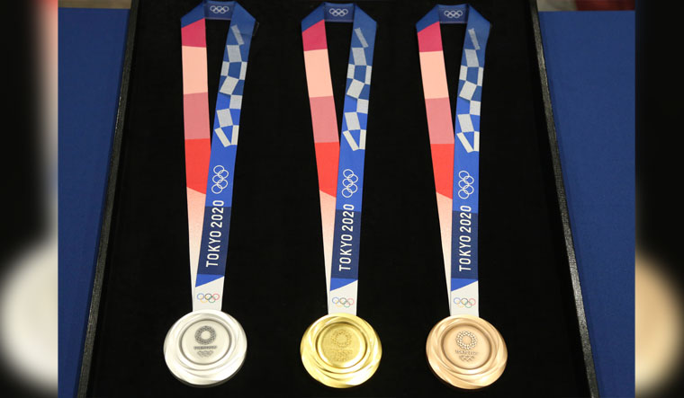 Tokyo Olympics unveil gold, silver, bronze medals