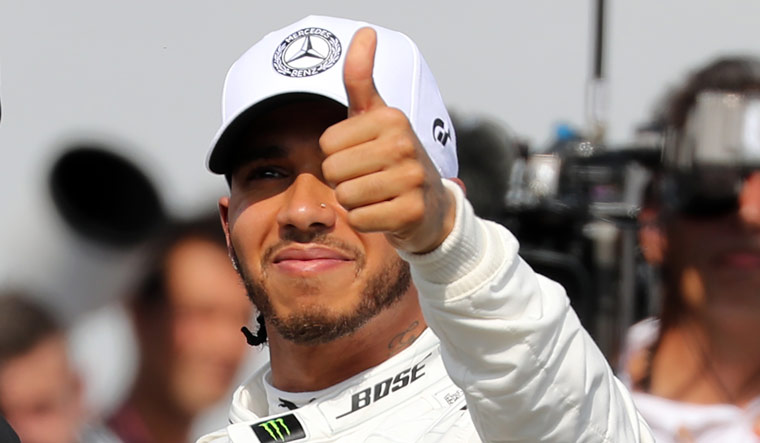 Hamilton on pole in German Grand Prix as Ferrari falters