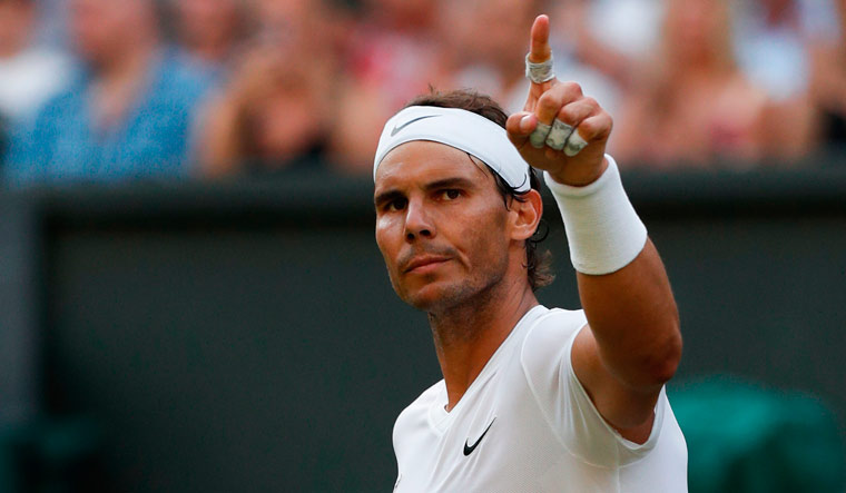 Wimbledon: Nadal beats Kyrgios in four-set thriller