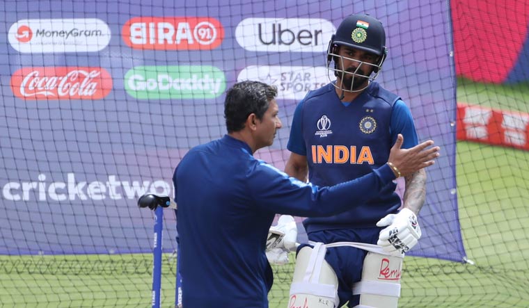 K.L. Rahul, right, listens to batting coach Sanjay Bangar in the nets during a training session | AP
