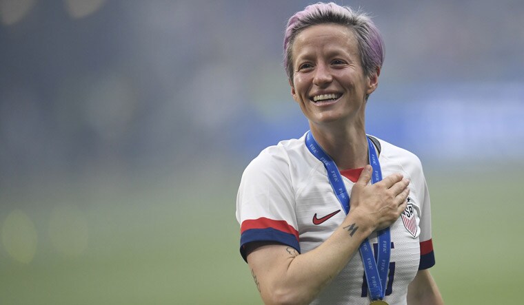 United States' Megan Rapinoe celebrates after winning the France 2019 Women's World Cup football final | AFP