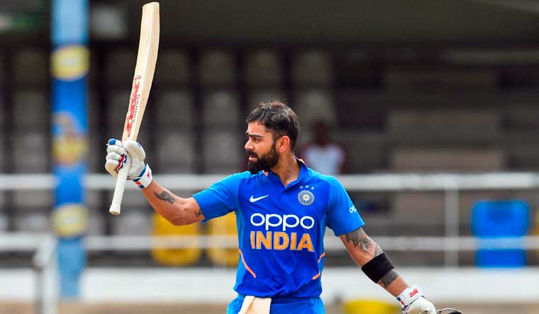 Virat Kohli of India celebrates his century during the 2nd ODI match between West Indies and India | AFP