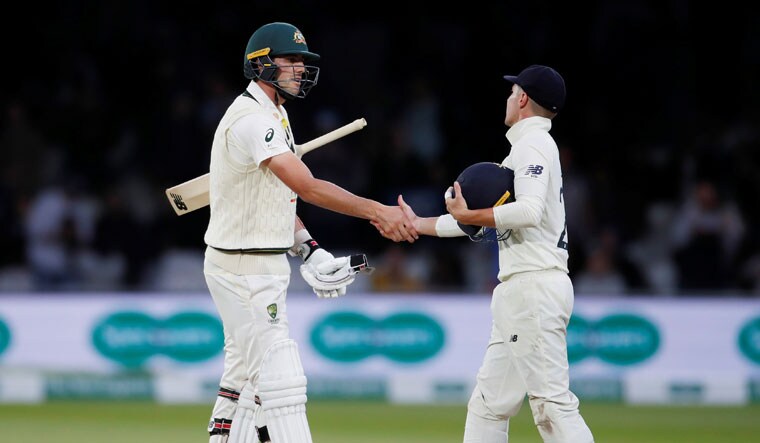 Australia's Pat Cummins and England's Rory Burns shake hands at the end of play as the second test ends in a draw | Reuters