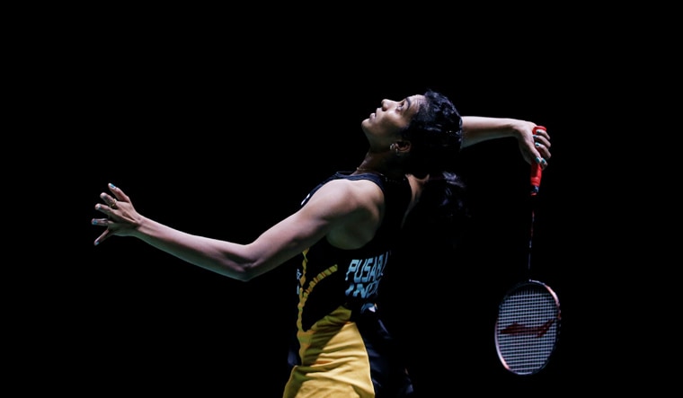 India's P.V.  Sindhu in action during her final women's singles match against Japan's Nozomi Okuhara | Reuters