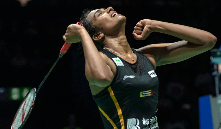 Sindhu cheers after winning her women's singles final match against Japan's Nozomi Okuhara | AP