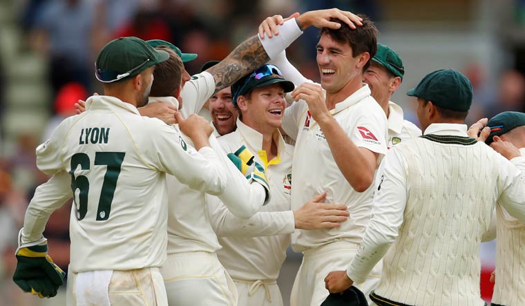 Australian players celebrate after taking England's last wicket in the opening Test of the Ashes series, at Edgbaston in Birmingham | Reuters