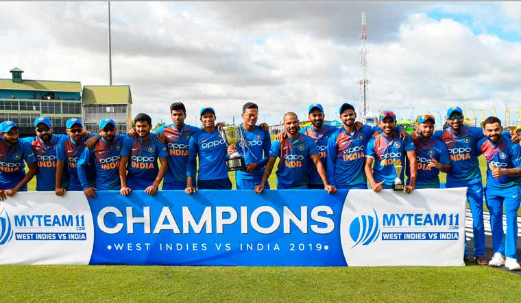 Team India poses after winning the 3rd T20I match and the series against the West Indies at Guyana National Stadium in Providence, Guyana | AFP