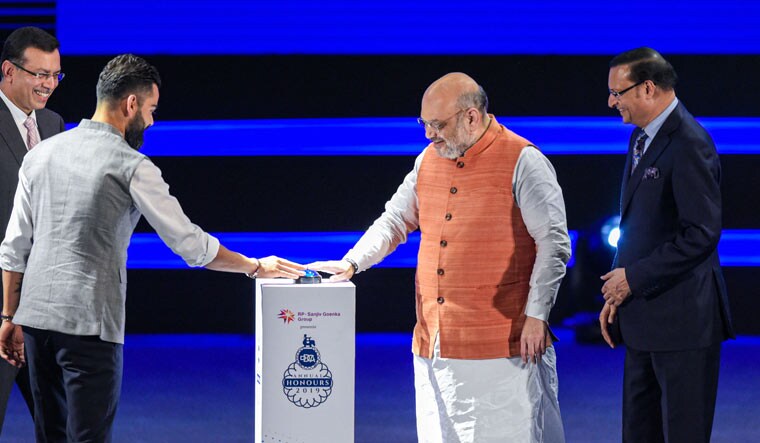 Home Minister Amit Shah and Indian cricket team Captain Virat Kohli digitally unveil a new pavilion stand bearing his name at newly renamed 'Arun Jaitley Stadium' in recognition of his contribution to the game, in New Delhi | PTI