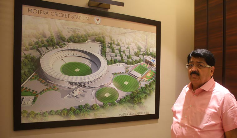 Parimal Nathwani, senior vice-president of the Gujarat Cricket Association, with the master plan of the Motera Cricket Stadium | Janak Patel