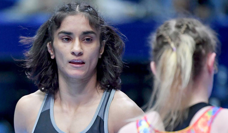 Vinesh Phogat (left) and Yuliia Khavaldzhy Blahinya of Ukraine compete in the repechage round of the women's Greco-Roman 53kg category at the World Wrestling Championships in Nur-Sultan, Kazakhstan | AP/PTI