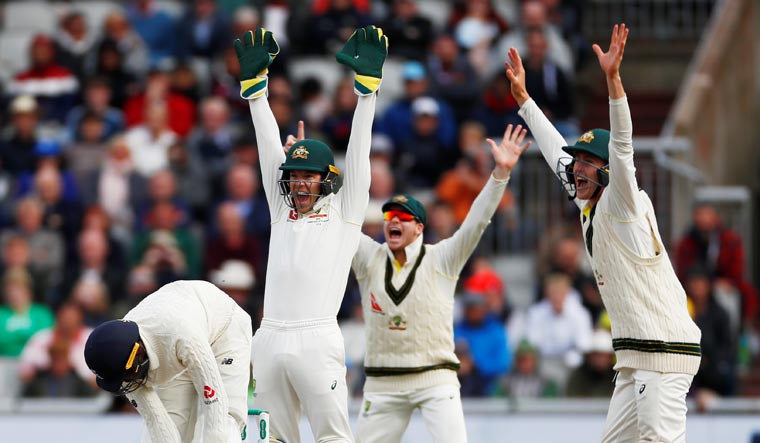 Australia's Tim Paine appeals successfully for the wicket of England's Jofra Archer | Reuters