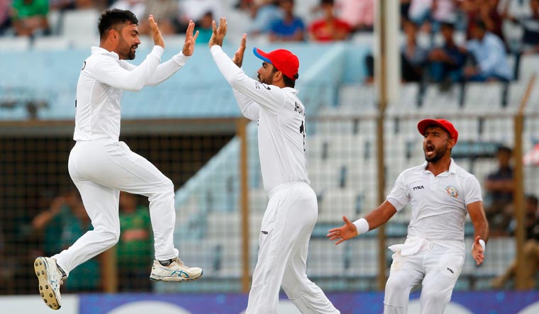 Rain delays start of fifth day as Afghanistan on cusp of Test victory 