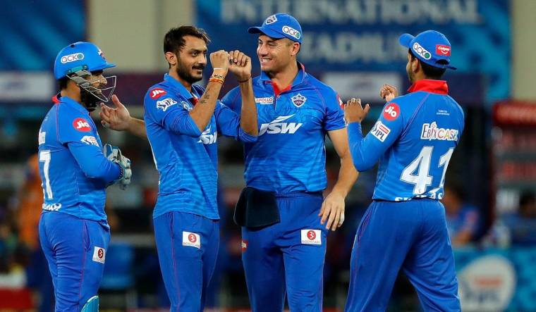 Delhi Capitals bowler Axar Patel (second from left) celebrates with his teammates | iplt20.com