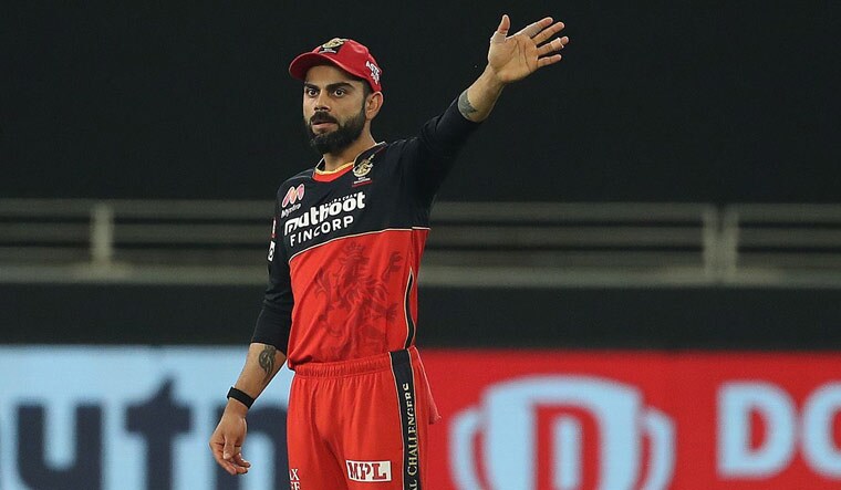 RCB skipper Virat Kohli sets the field during the IPL 2020 against the Delhi Capitals at the Dubai International Cricket Stadium | iplt20.com