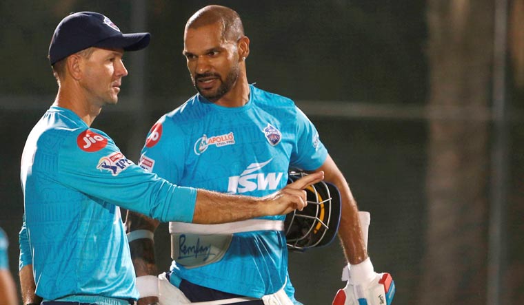 Delhi Capitals batsman Shikhar Dhawan with coach Ricky Ponting during a net session ahead of their IPL play-off match against Mumbai Indians, in Dubai | PTI