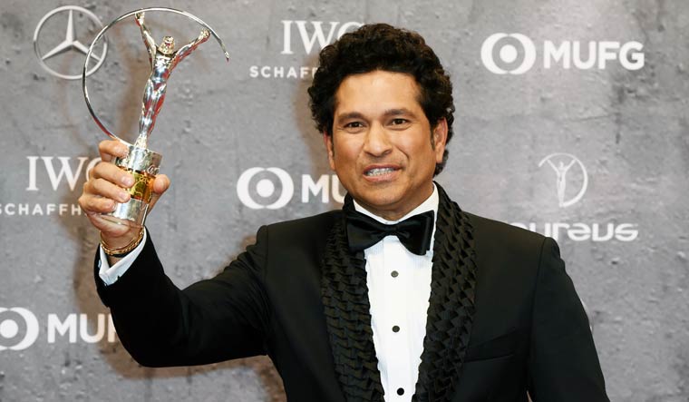 Sachin Tendulkar with the Laureus Best Sporting Moment award for ‘Carried on the shoulders of a nation’ | Reuters