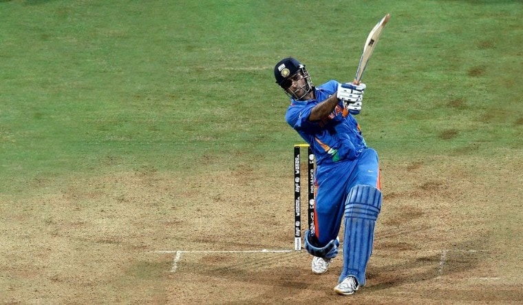 (File) M.S. Dhoni hitting the iconic six to win the World Cup final against Sri Lanka in 2011
