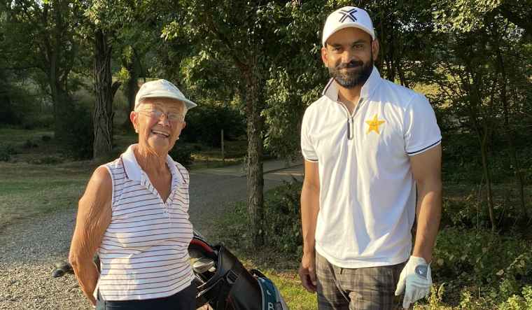 Pakistan cricketer Mohammad Hafeez seen with an elderly lady at the golf course adjacent to the team hotel | via Twitter/@MHafeez22