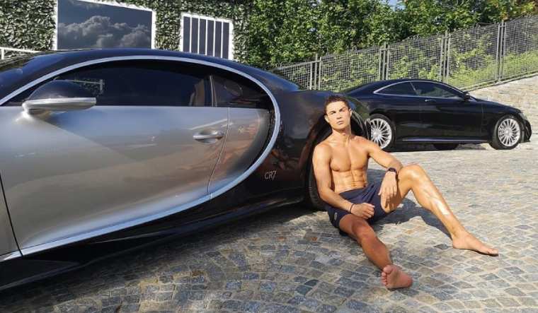Cristiano Ronaldo with his latest Bugatti La Voiture Noire | via Instagram/@cristiano 