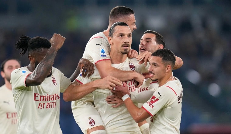 AC Milan's Zlatan Ibrahimovic celebrates after scoring his side's opening goal during the Series A match between AS Roma and Milan | AP