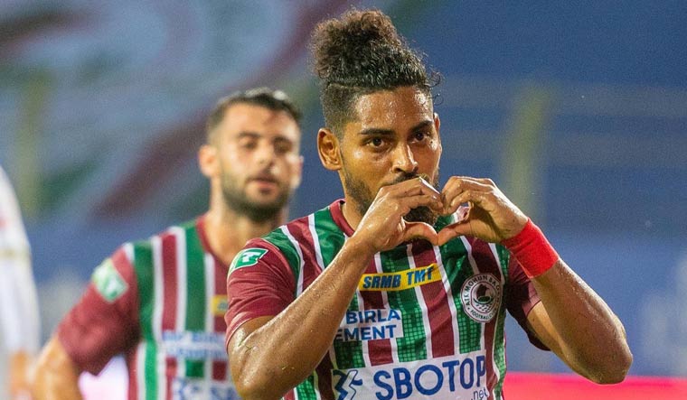ATK Mohun Bagan's Roy Krishna celebrates after scoring a penalty against Kerala Blasters in the opening match of the ISL 2021-22 season, in Goa | via Twitter