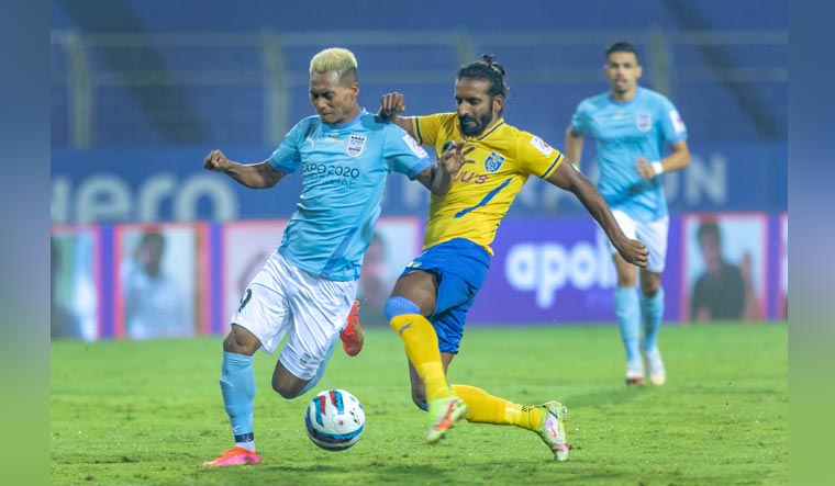 Bipin Singh Thounaojam of Mumbai City FC and Harmanjot Singh Khabra of Kerala Blasters FC vie for ball during the Indian Super League match | PTI