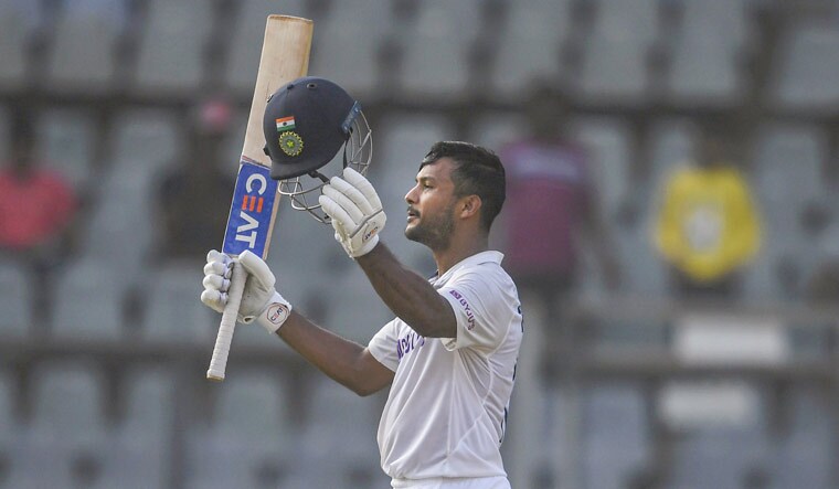 Mayank Agarwal celebrates his century on the first day of second Test match played between India and New Zealand at Wankhede stadium, in Mumbai | PTI