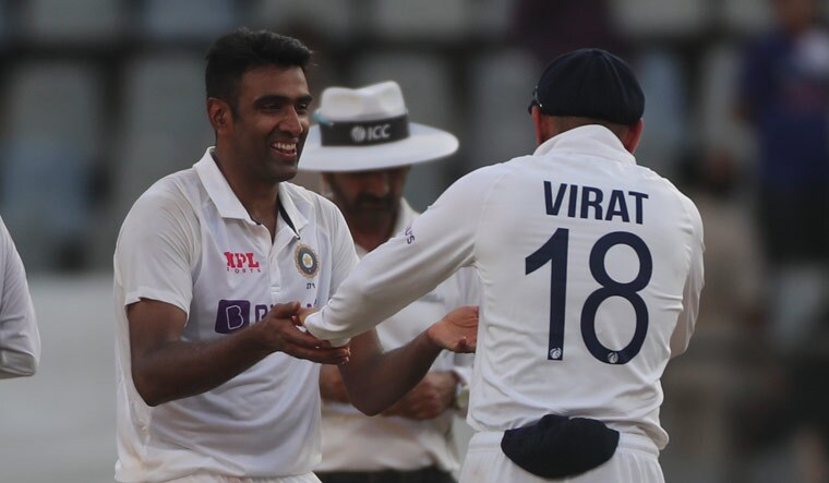 India's Ravichandran Ashwin shares a light moment with Virat Kohli during day three of their second Test match against New Zealand in Mumbai | AP