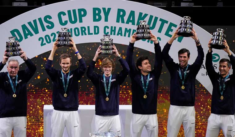 The Russian tennis team celebrate after winning the Davis Cup final at the Madrid Arena | AP