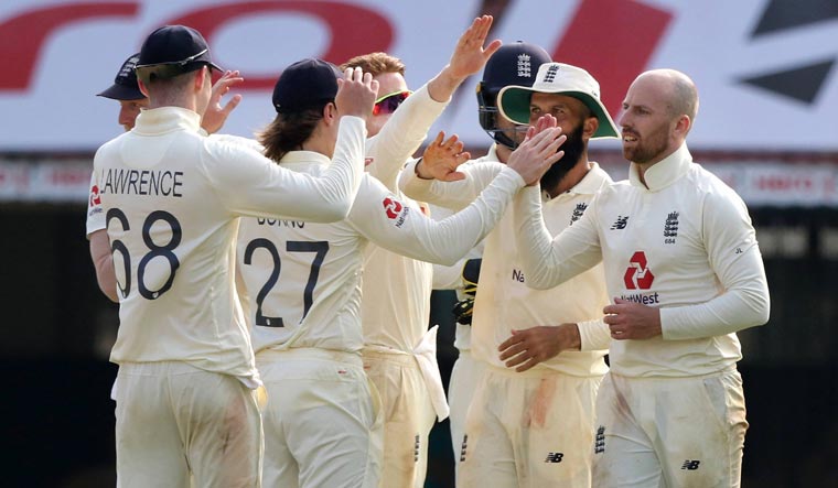 Jack Leach celebrates with teammates the wicket of Rohit Sharma during the first day of second Test match between India and England, at MA Chidambaram Stadium in Chennai | BCCI/PTI