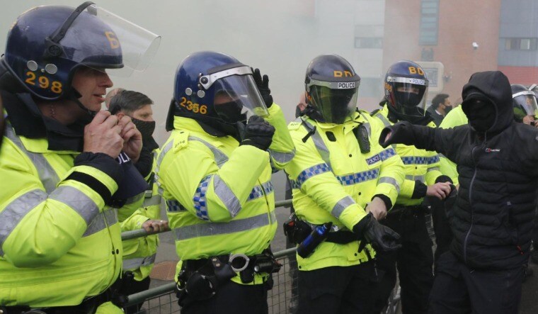 Police outside the Old Trafford stadium | Reuters