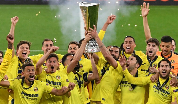 Villarreal players lift the trophy after the Europa League final soccer match between Manchester United and Villarreal in Gdansk, Poland | AP