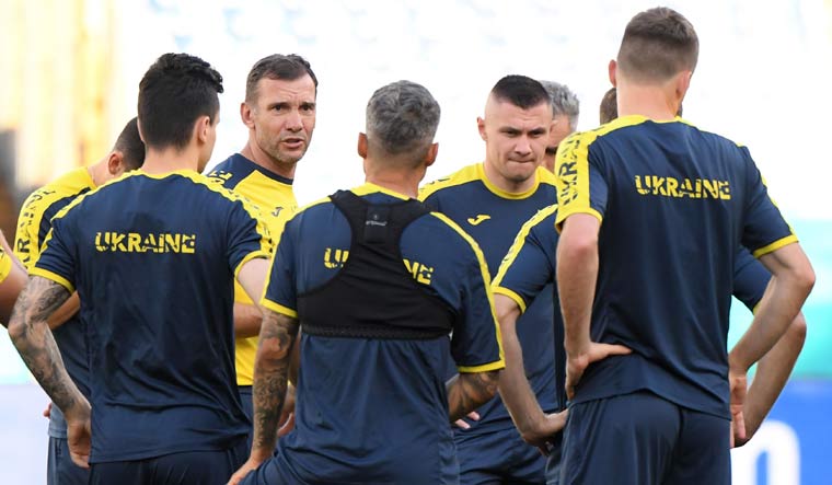 Ukraine coach Andriy Shevchenko with players during training | Reuters