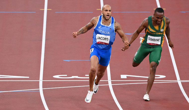 marcell-jacobs-100m-olympics-ap