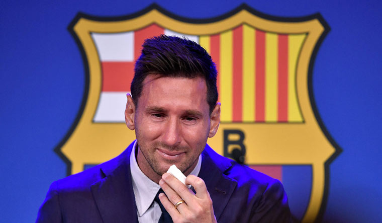 Barcelona's Argentinian forward Lionel Messi breaks down during a press conference at the Camp Nou stadium in Barcelona | AP