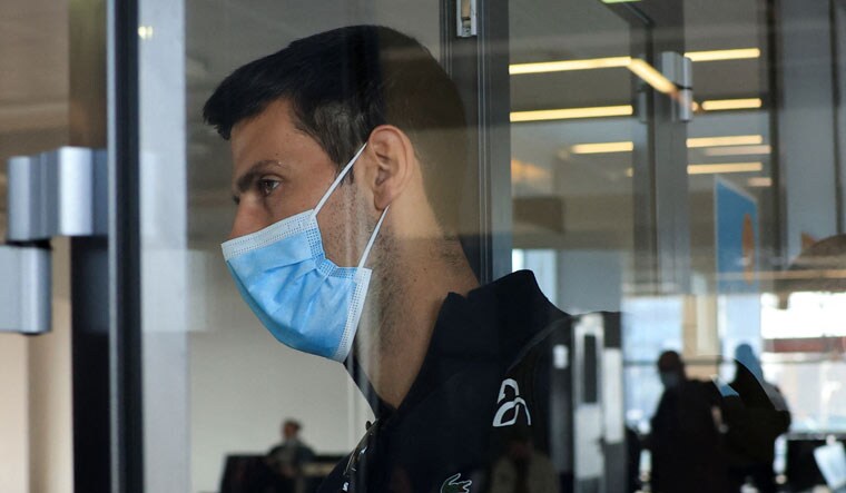 Novak Djokovic arrives at Nikola Tesla Airport, after the Australian Federal Court upheld a government decision to cancel his visa to play in the Australian Open, in Belgrade, Serbia | Reuters