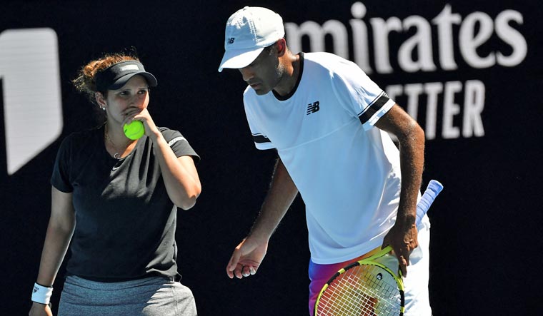 Sania Mirza and Rajeev Ram during their quarterfinal match in the mixed doubles of the Australian Open | AFP