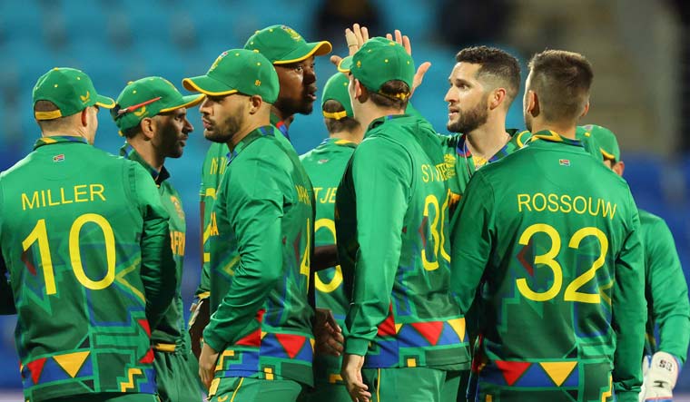 South African players celebrate the wicket of Zimbabwe's Craig Ervine | AFP