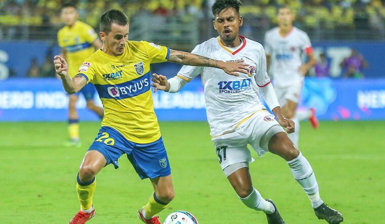 Adrian Luna (left) of Kerala Blasters FC and Tuhin Das of East Bengal FC vie for the ball | PTI