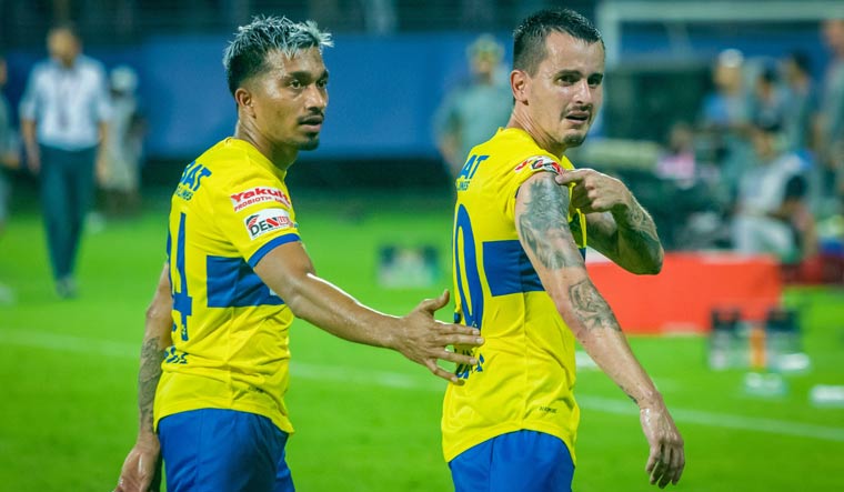 Adrian Luna (right) with Kerala Blasters skipper Jessel Carneiro during the ISL 2022-23 opening match, in Kochi | via Twitter