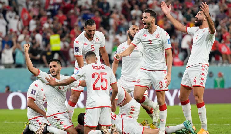 Tunisian players celebrate after Wahbi Khazri scored goal against France | AP