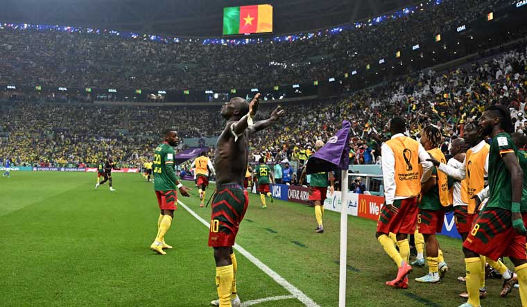 Cameroon's Vincent Aboubakar celebrates scoring their first goal in the Group G match against Brazil at Lusail Stadium in Qatar | Reuters