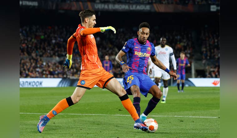 Barcelona's Pierre-Emerick Aubameyang in action with Napoli's Alex Meret in the Europa League | Reuters