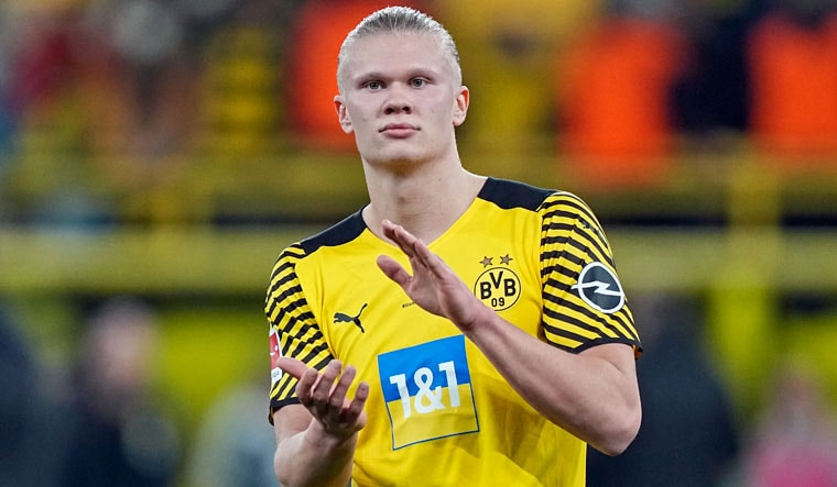 Dortmund's Erling Haaland claps hands after winning the German Bundesliga soccer match between Borussia Dortmund and Arminia Bielefeld in Dortmund, Germany, Sunday, March 13, 2022 | AP
