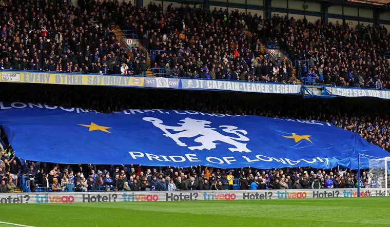 [File] Fans of Chelsea FC hold up a banner ahead of an EPL match at Stamford Bridge, London | Reuters