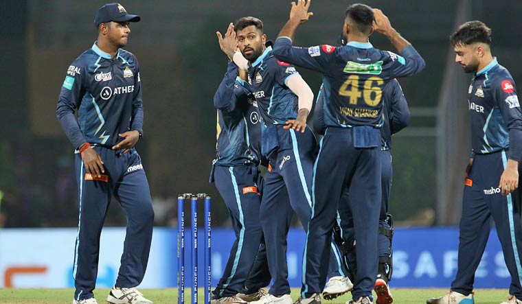 Hardik Pandya of Gujarat Titans celebrates the wicket of James Neesham of Rajasthan Royals during the Indian Premier League 2022 match between the Rajasthan Royals and the Gujarat Titans, at the DY Patil Stadium in Mumbai, Thursday, April 14, 2022 | PTI